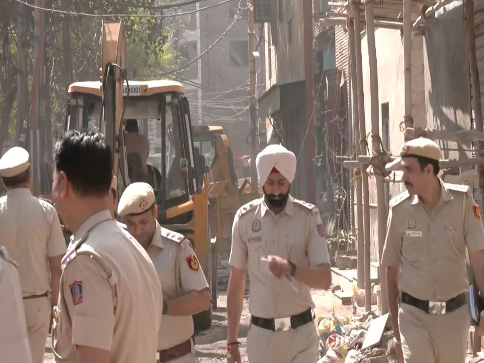 Delhi municipal body carries out bulldozer action (Photo/ANI)