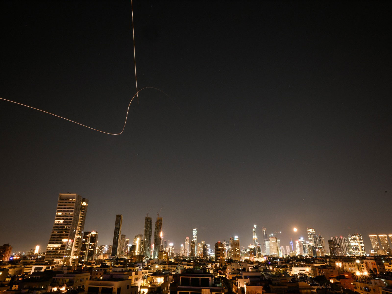 An interception attempt is made by Israel as missiles are launched from Iran amid the West Asia tensions, as seen from Tel Aviv (Photo/ Reuters)