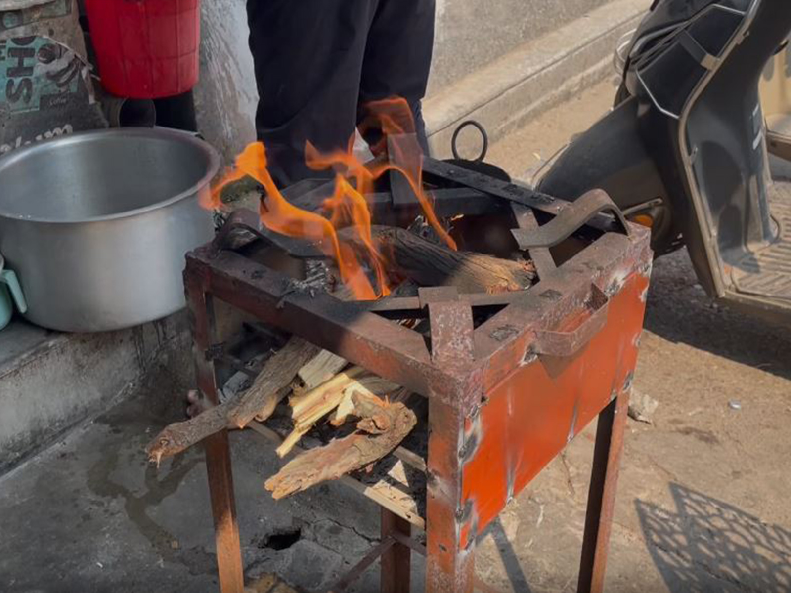 Visual of stove with wooden logs prepared by Chandu (Photo/ANI)
