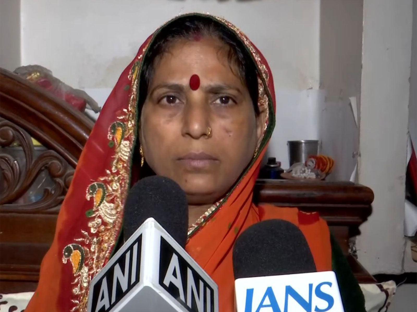 Mother of victim in Uttam Nagar muder case (Photo/ANI) Mother of victim in Uttam Nagar muder case (Photo/ANI)