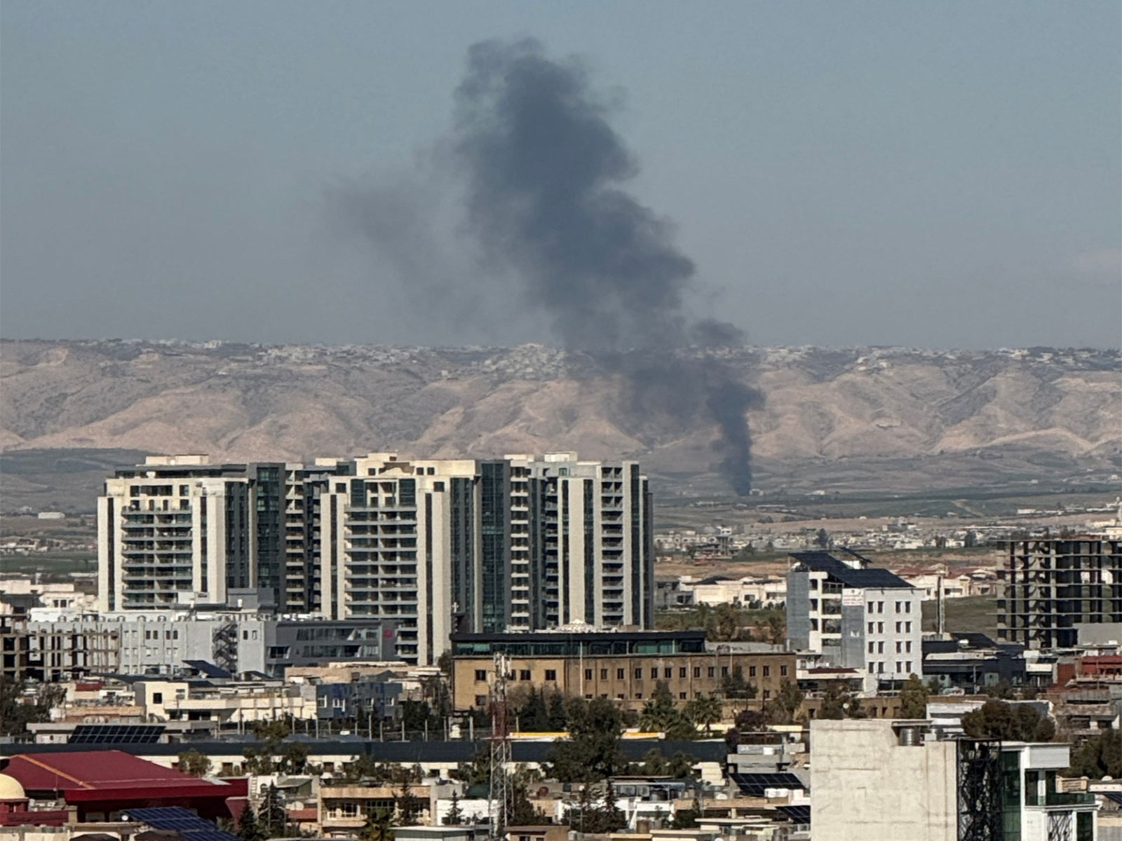 Smoke rises from the site of a drone crash on the outskirts of Erbil, Iraq (File Photo/ Reuters)