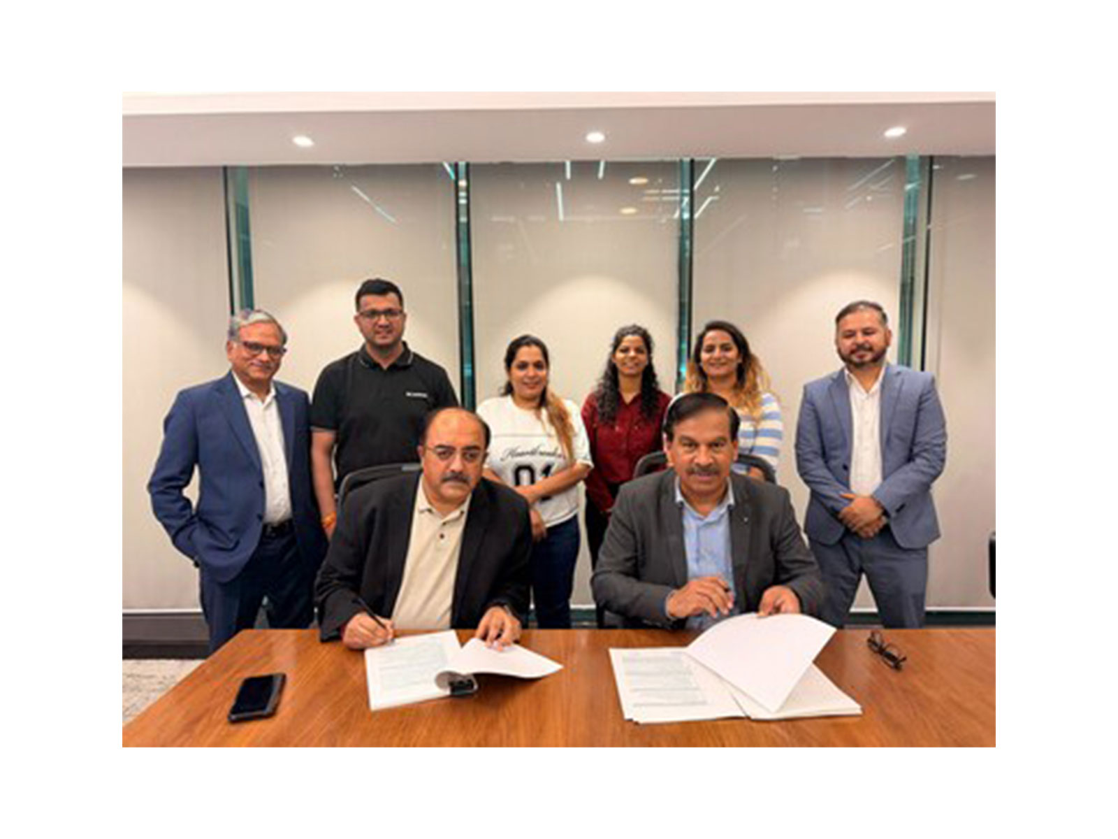 Representatives from Sunsure Energy and Jakson Engineering Representatives from Sunsure Energy and Jakson Engineering