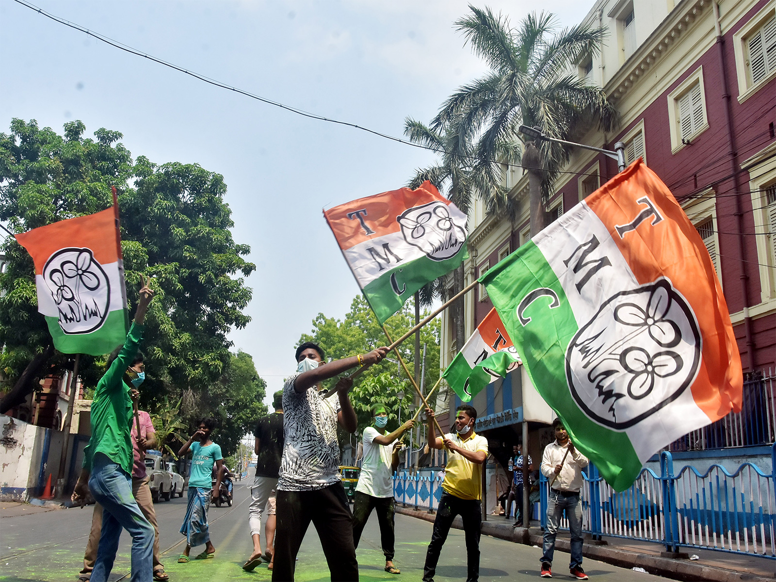 TMC supporters wave party flag in Kolkata (File Photo/ANI) TMC supporters wave party flag in Kolkata (File Photo/ANI)