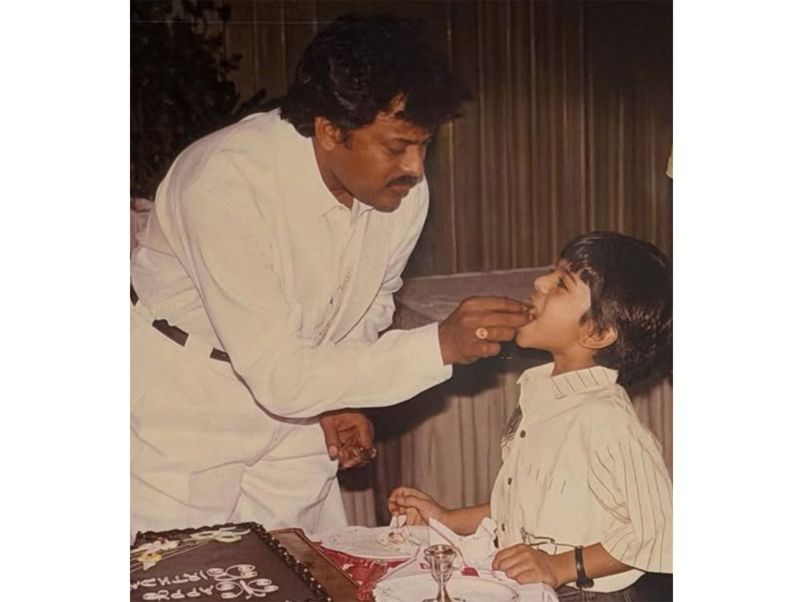 Ram Charan's childhood pic with dad Chiranjeevi (Image source: Chiranjeevi's Instagram)
