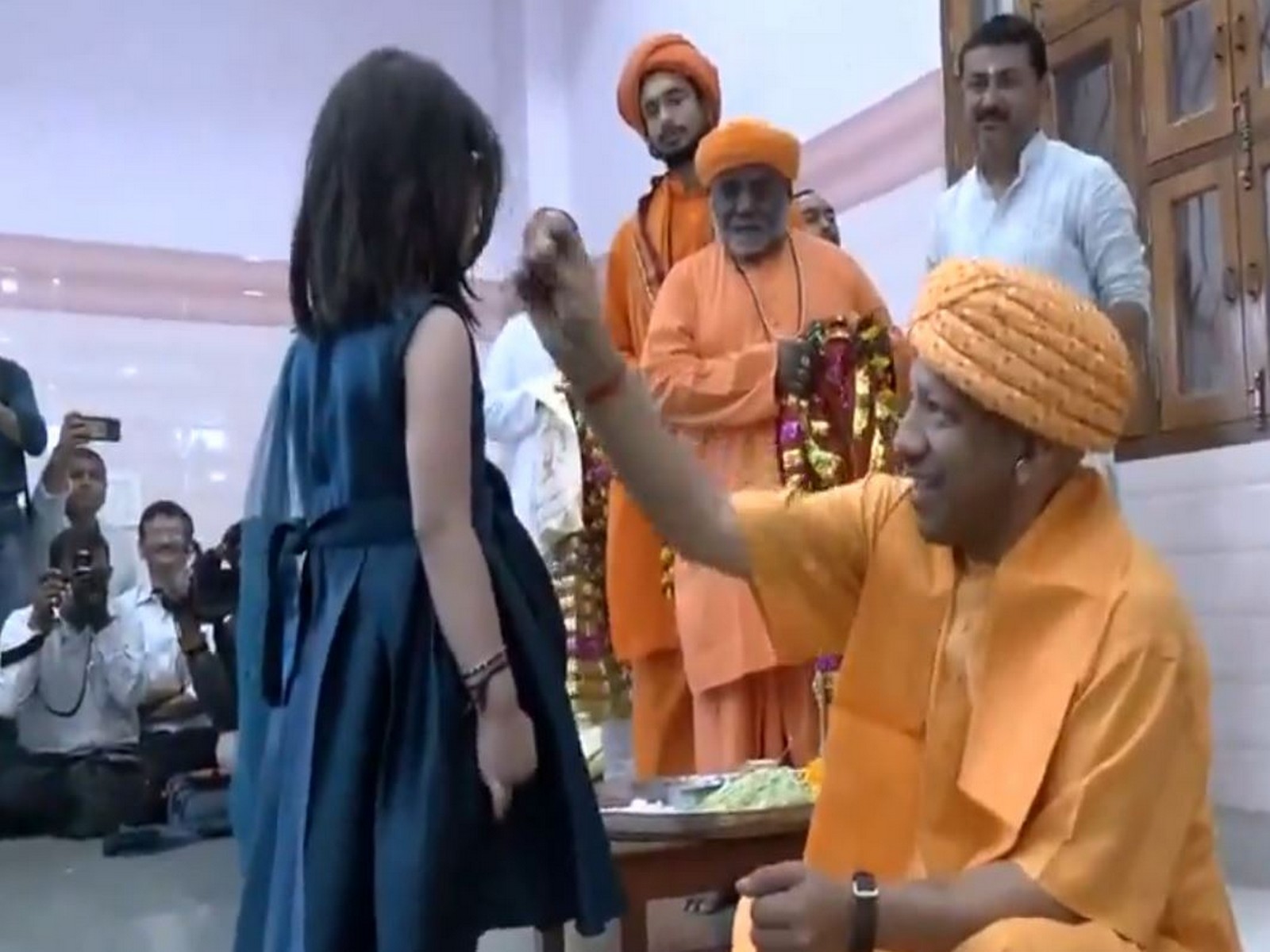 Uttar Pradesh CM Yogi Adityanath performs Kanya Pujan on ninth day of Chaitra Navratri (Photo/ANI) Uttar Pradesh CM Yogi Adityanath performs Kanya Pujan on ninth day of Chaitra Navratri (Photo/ANI)