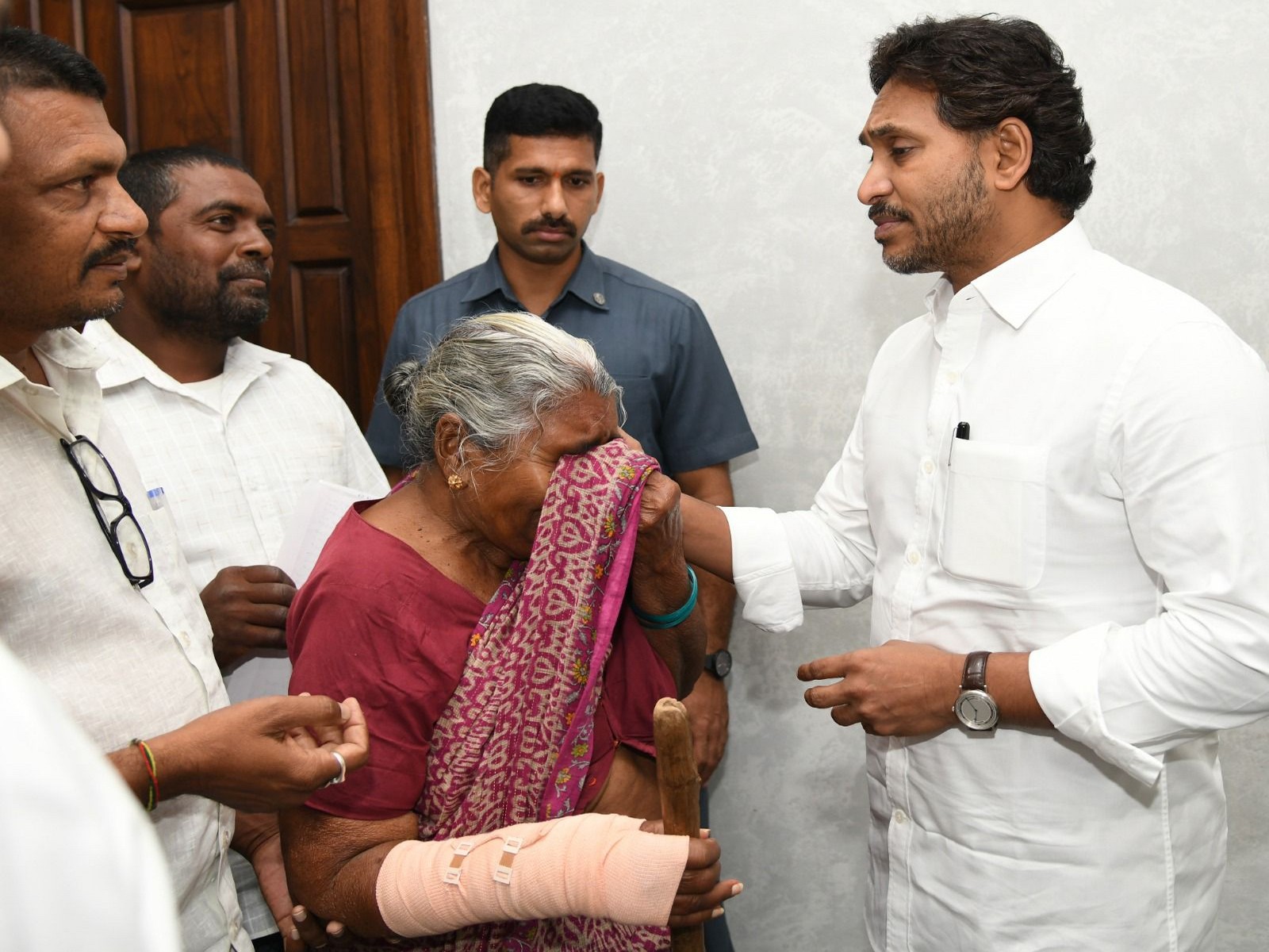 YS Reddy meets 90-year-old woman alleging land grab (Photo/ANI)