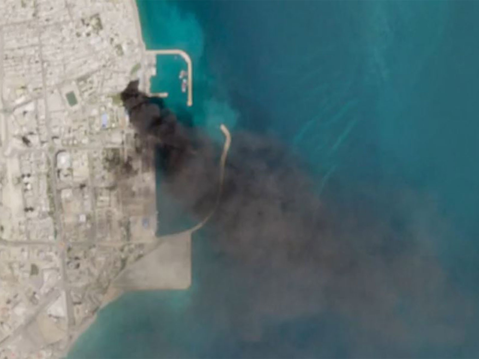 Satellite imagery shows damage, smoke at Iran’s Qeshm port after US-Israeli strikes (Photo/Reuters)