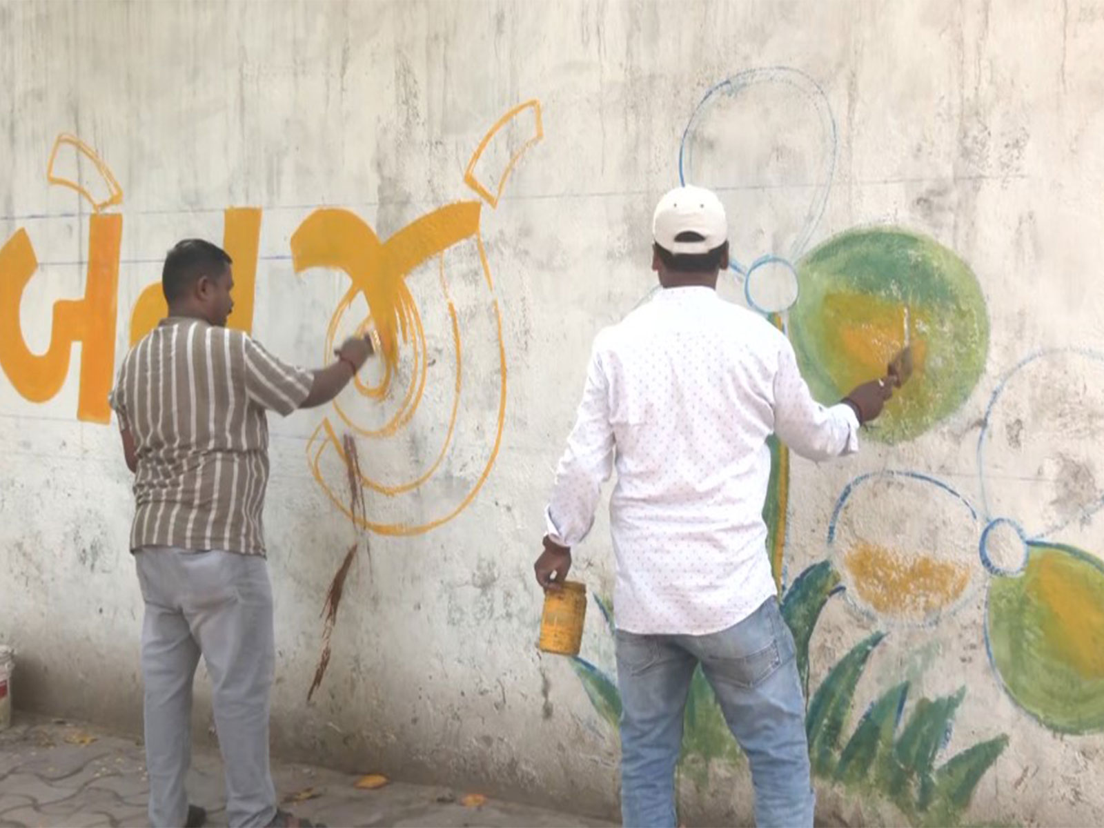 Wall writing in Gujrati language in support of TMC candidate Mamata Banerjee (Photo/ANI)