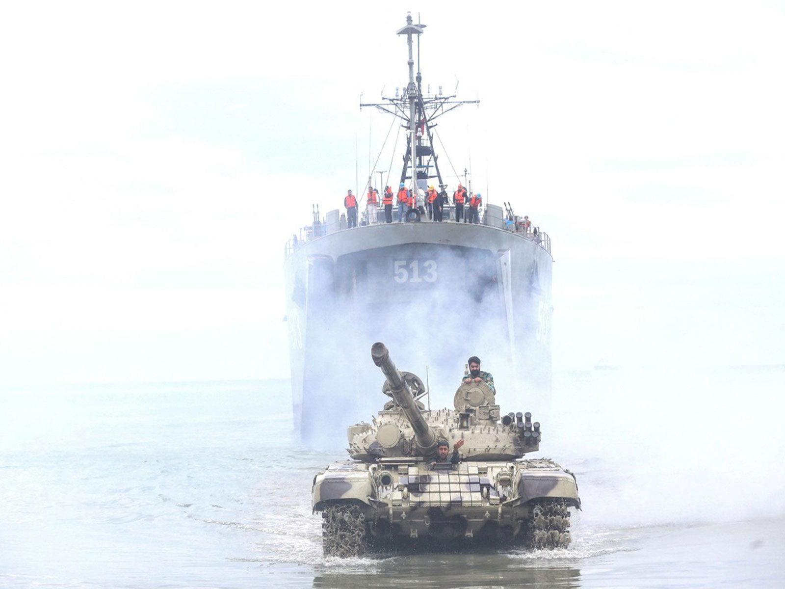 Members of the Iranian Army take part in an annual drill in the coastal area of the Gulf of Oman and near the Strait of Hormuz (File Photo/ Reuters via WANA)