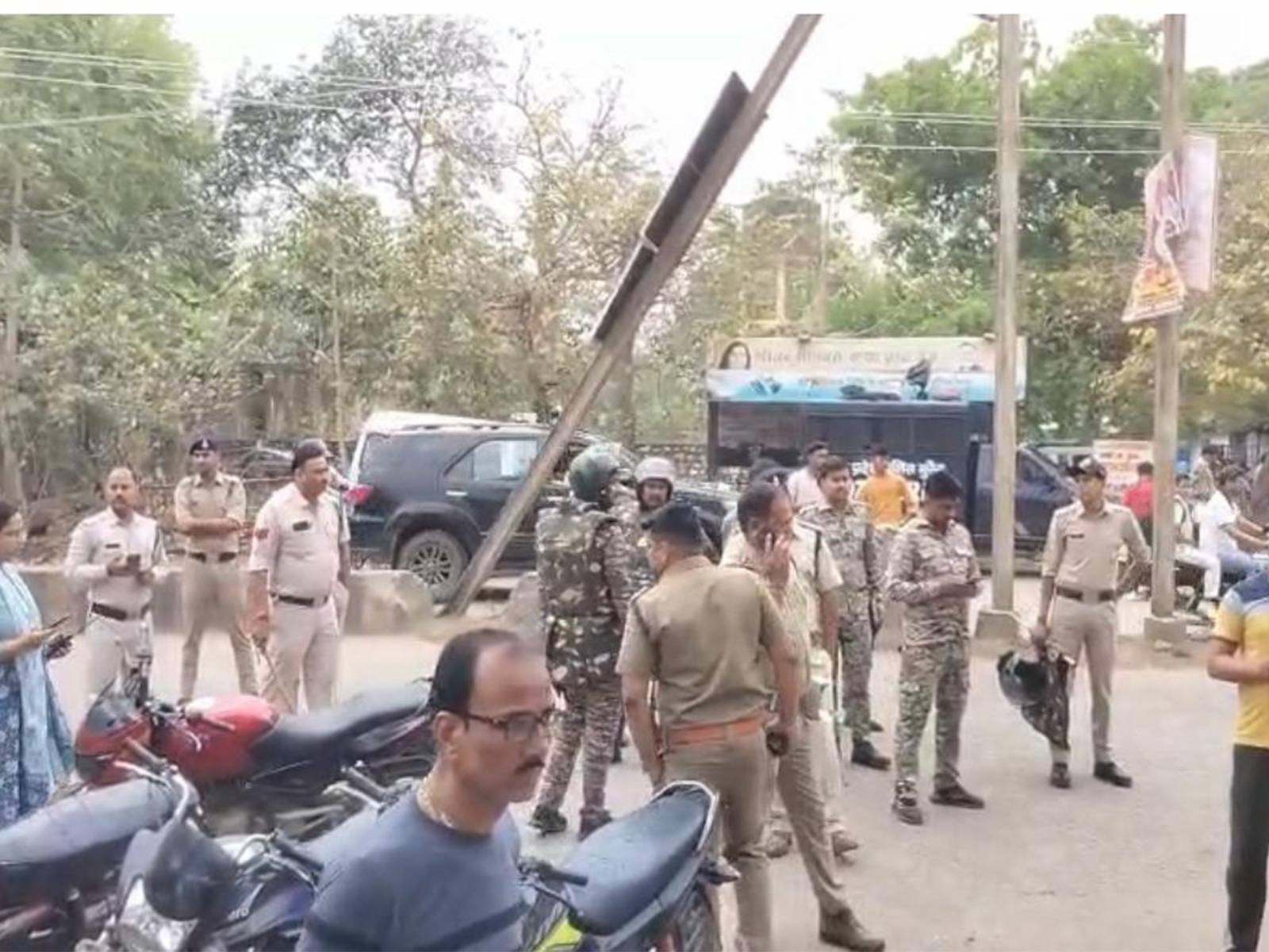 Police force present outside Morena district hospital where post mortem of forest guard is being conducted (Photo/ANI)