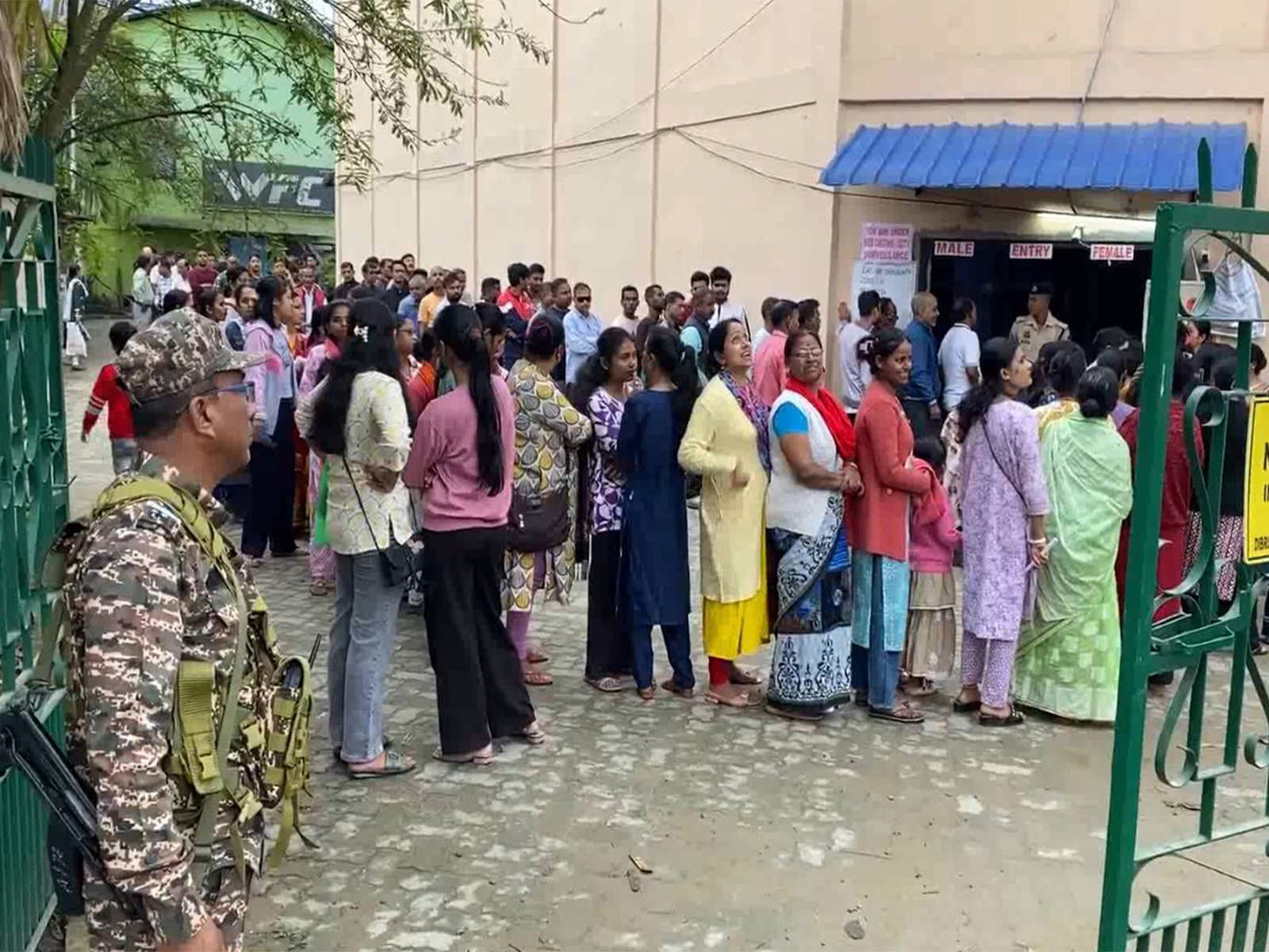 Voters line up at a polling booth in Dibrugarh (Photo/ANI) Voters line up at a polling booth in Dibrugarh (Photo/ANI)