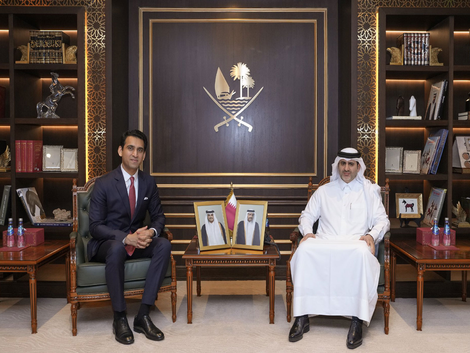 Sagar Adani, Executive Director of Adani Green Energy (Left), met Sheikh Bandar Al Thani, Governor, Qatar Central Bank. (Right) (Photo- X@@QCBQATAR) 
