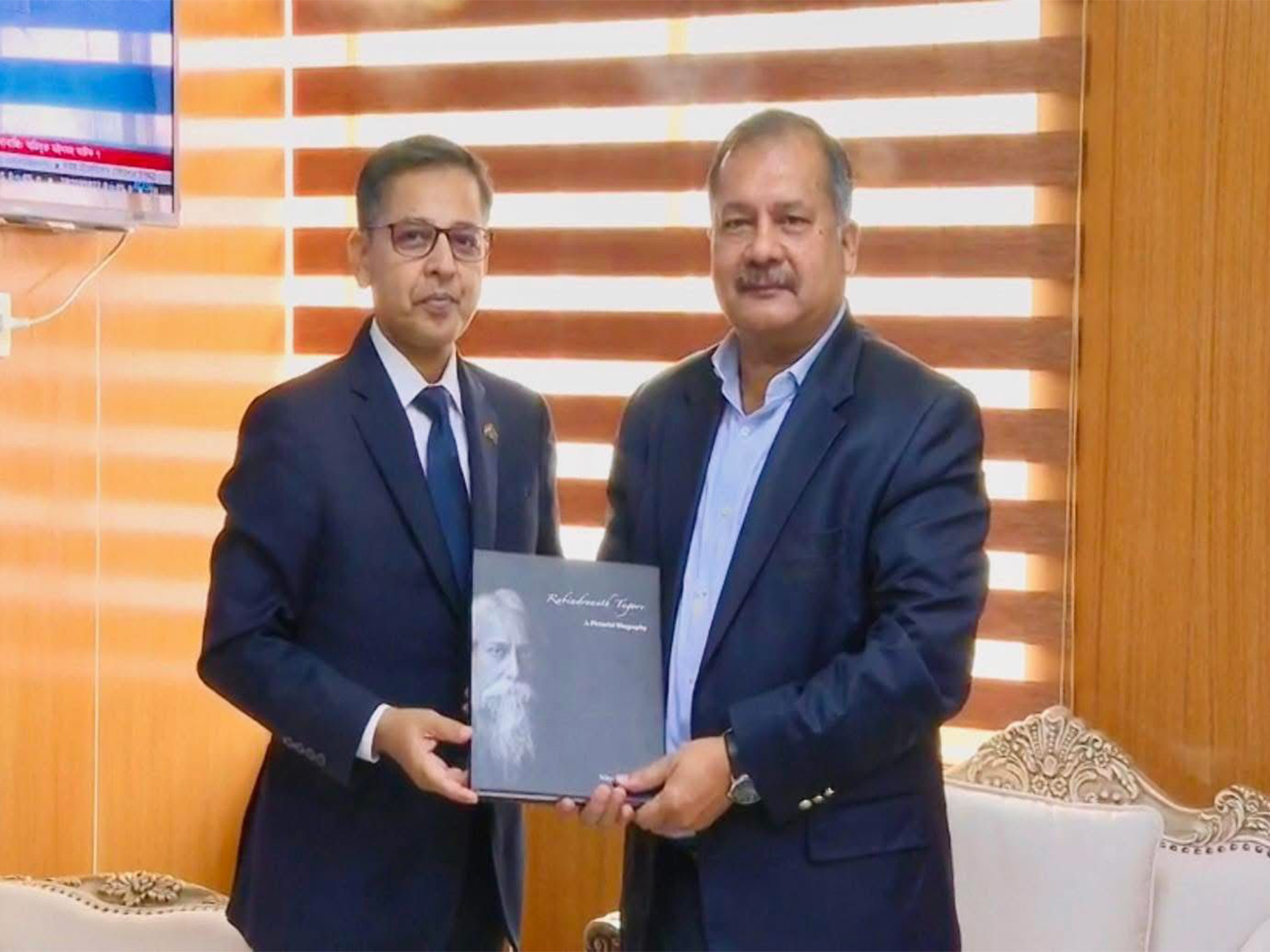 Indian High Commisioner Pranay Verma with  Minister of Information and Broadcasting of Bangladesh Zahir Uddin Swapon (Photo/High Commission of India, Dhaka)