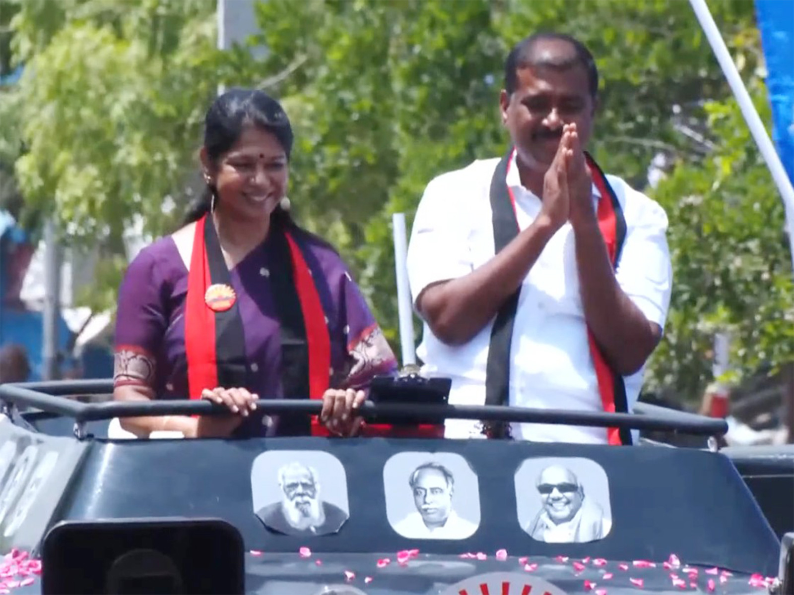 DMK MP Kanimozhi Karunanidhi and Vilathikulam DMK candidate G V Markandayan (Photo/ANI)