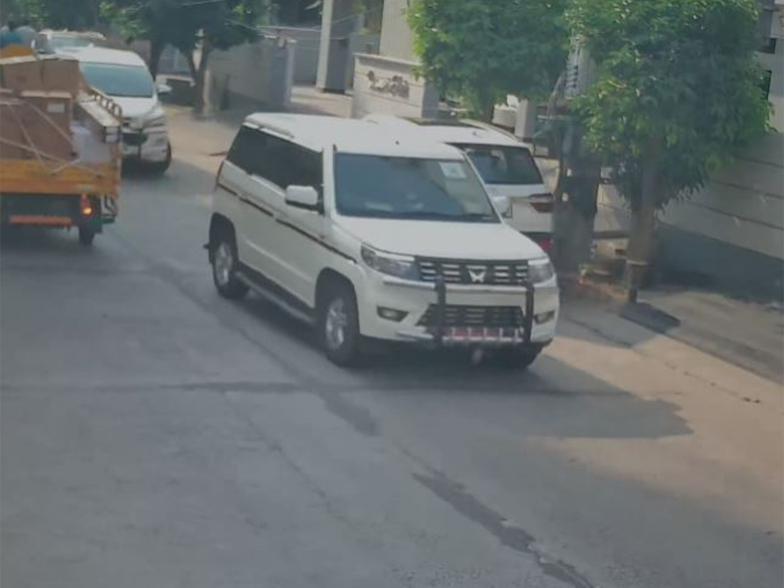 CCTV images of police team detaining Pudi Srihari  (Photo/X/YSRC Party)