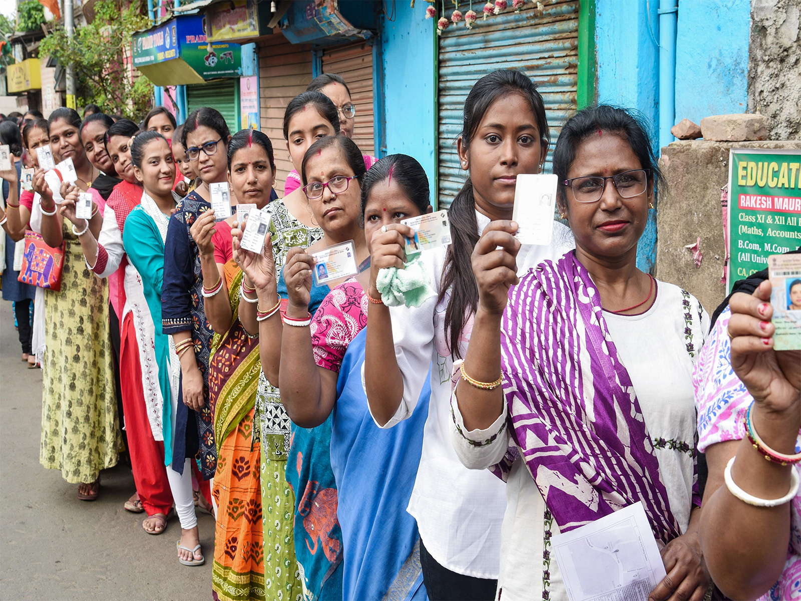 Voters in queue to cast their ballot in Kolkata (Photo/ANI)