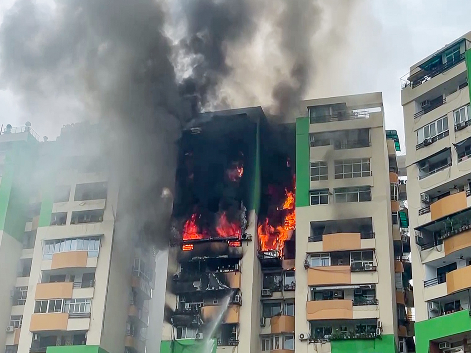 Massive fire at Gaur Green Avenue residential complex in Ghaziabad (Photo/ANI)