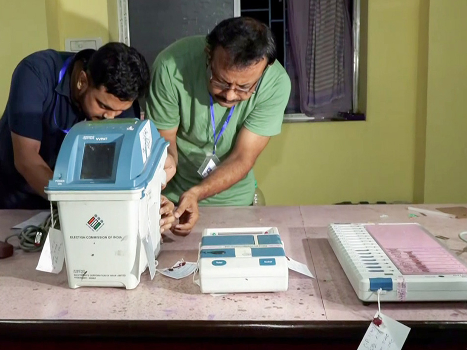 Polling officials seal VVPAT and EVM in the Arambagh Assembly constituency (Photo/ANI)