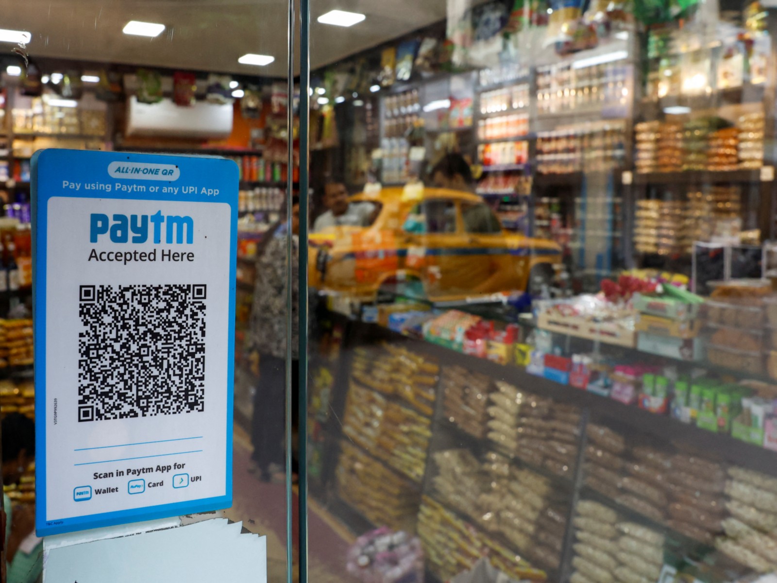 A QR code sticker of the digital payment app Paytm is seen outside a grocery store in Kolkata (Photo/Reuters) A QR code sticker of the digital payment app Paytm is seen outside a grocery store in Kolkata (Photo/Reuters)