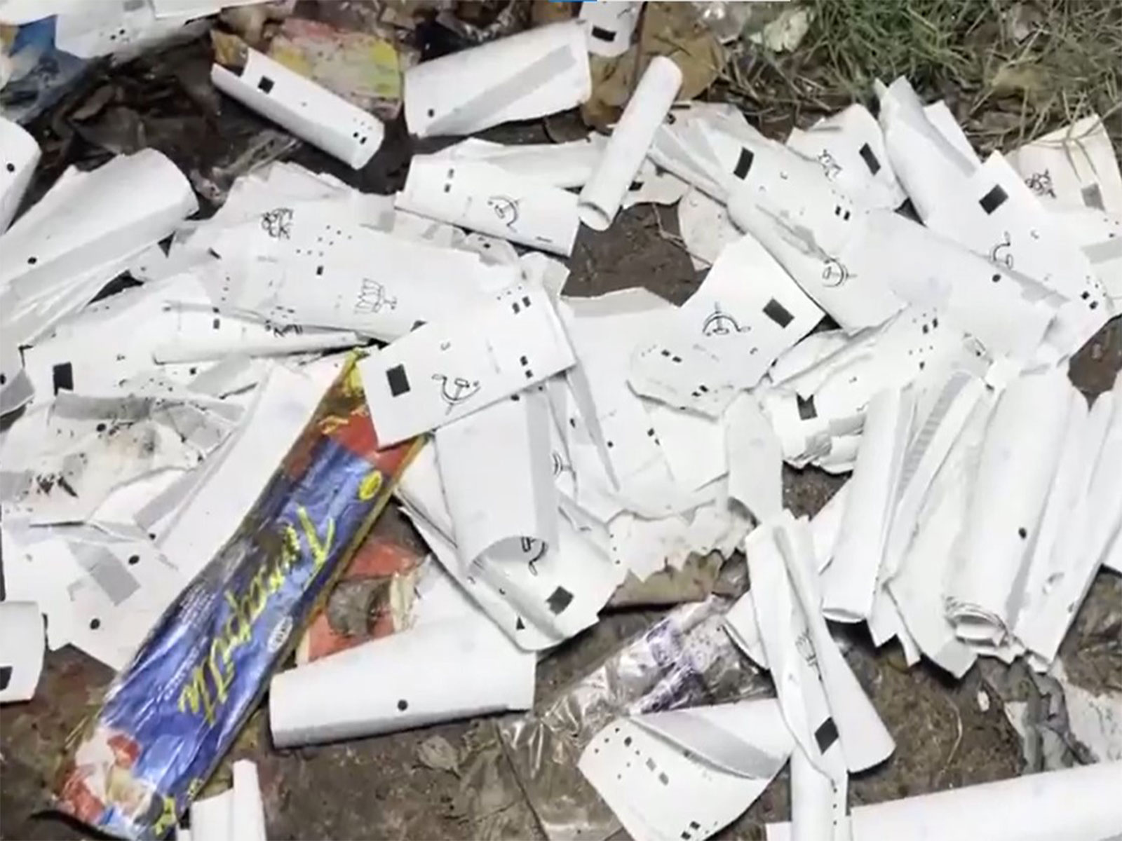 VVPAT slips  allegedly from booth number 29 of ​​Noapara Assembly were found discarded in Subhashnagar (Photo/ANI)
