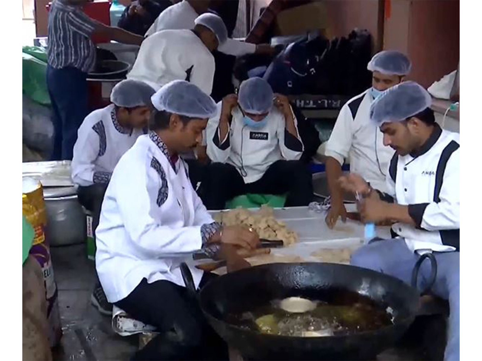 Poori and sweets being prepared at the BJP Headquarters (Photo/ANI) Poori and sweets being prepared at the BJP Headquarters (Photo/ANI)