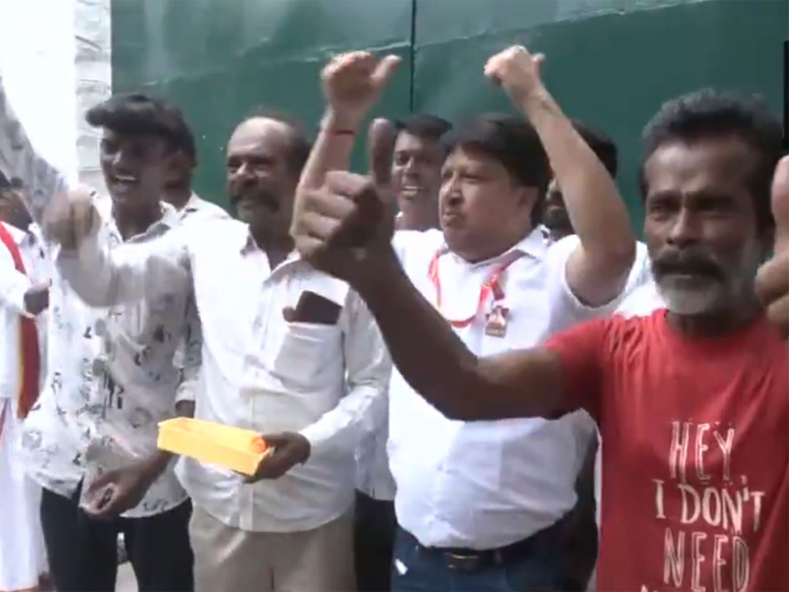 TVK workers and supporters celebrate outside the TVK office in Chennai (Photo/ANI)
