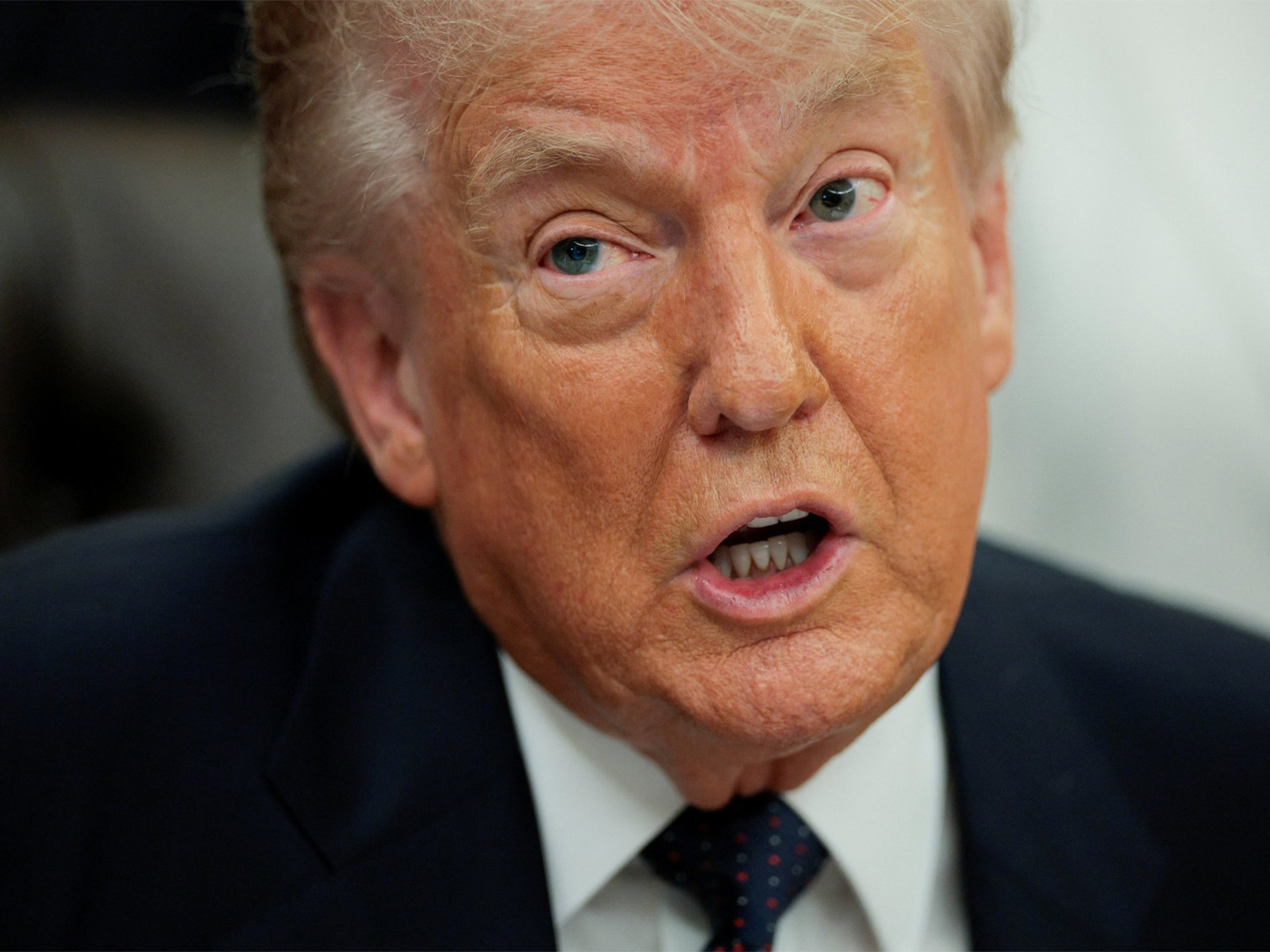 U.S. President Donald Trump speaks during an event to sign a memorandum in the Oval Office at the White House in Washington (Photo/ Reuters)