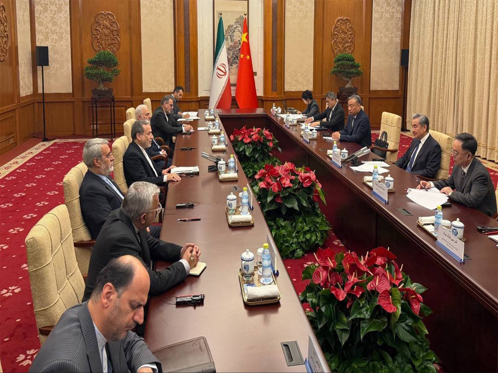 Iranian Foreign Minister Abbas Araghchi holds talks with Chinese Foreign Minister Wang Yi during a high-level meeting in Beijing. (Image Source: Iranian state media) 
