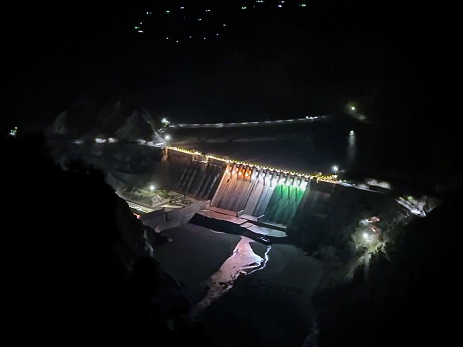 Salal Dam illuminated in Tricolour in Reasi, Jammu and Kashmir (Photo/ ANI)