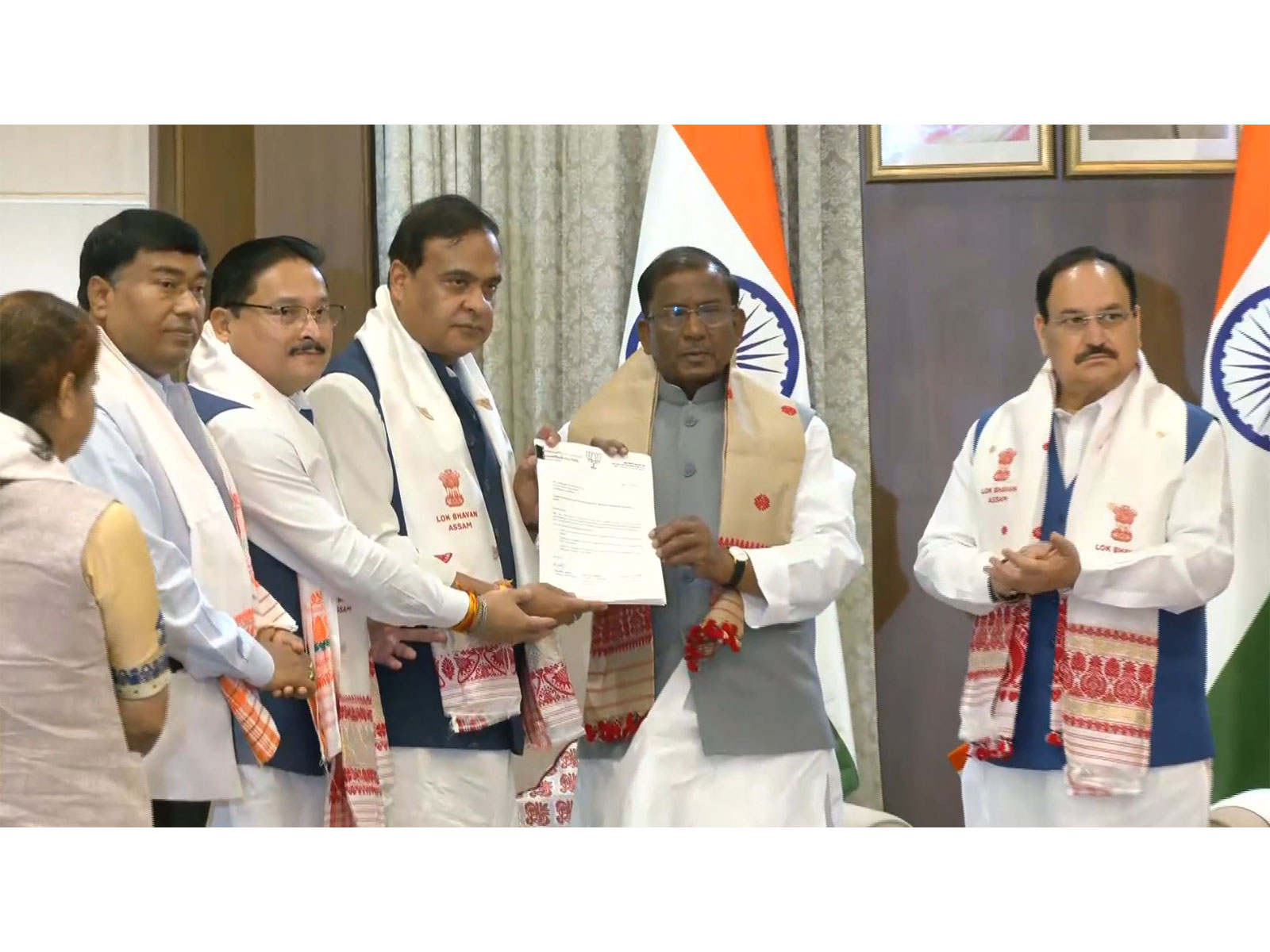 Leader of BJP Legislature Party and NDA Legislature Party in Assam, Himanta Biswa Sarma with Assam Governor Lakshman Prasad Acharya (Photo/ANI)