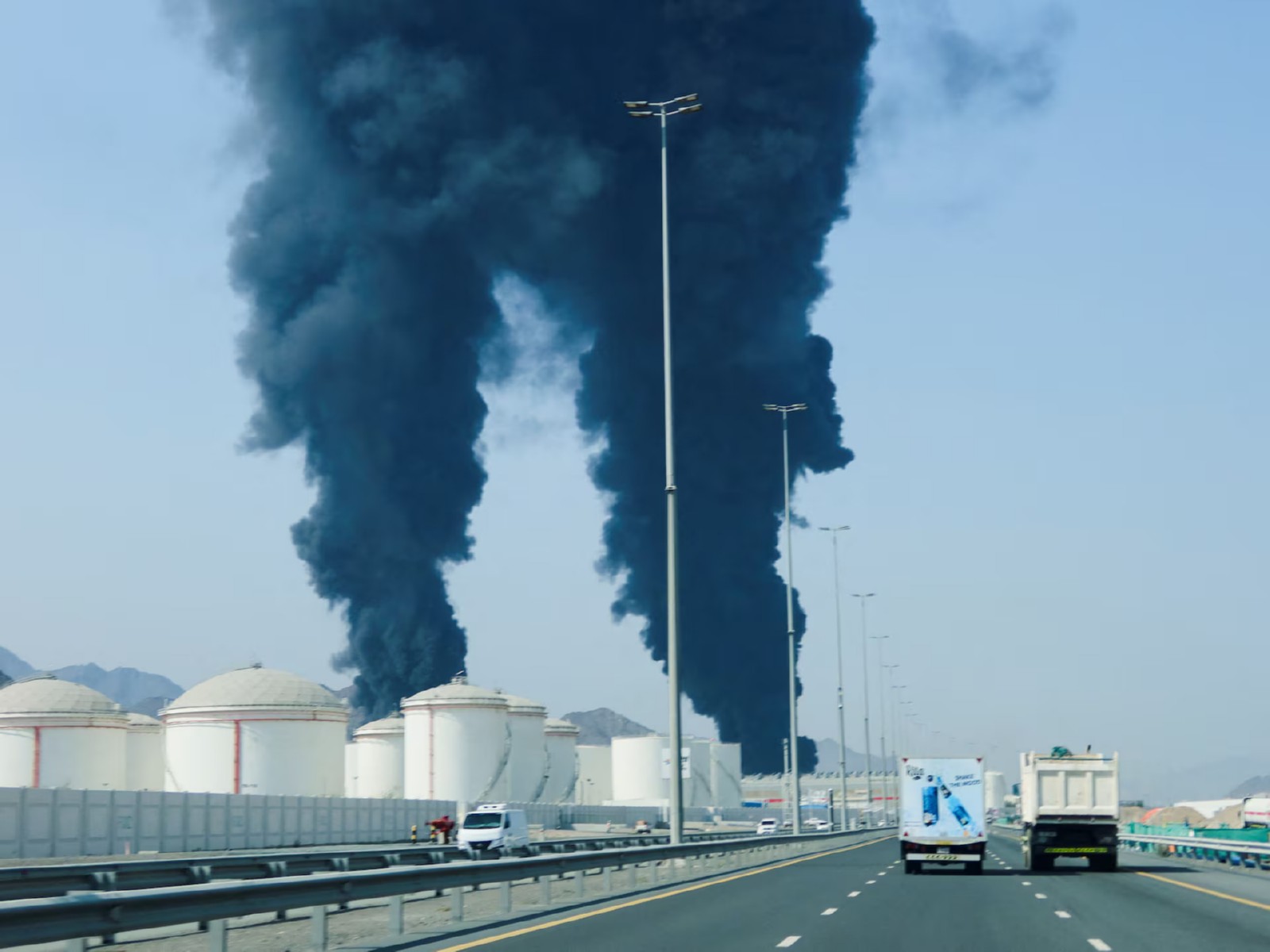 Smoke rises in the Fujairah Oil Industry Zone after debris from a drone intercepted by air defences fell in the area, according to the Fujairah media office, amid the US-Israel conflict with Iran, in Fujairah, United Arab Emirates. (File Photo/Reuters)