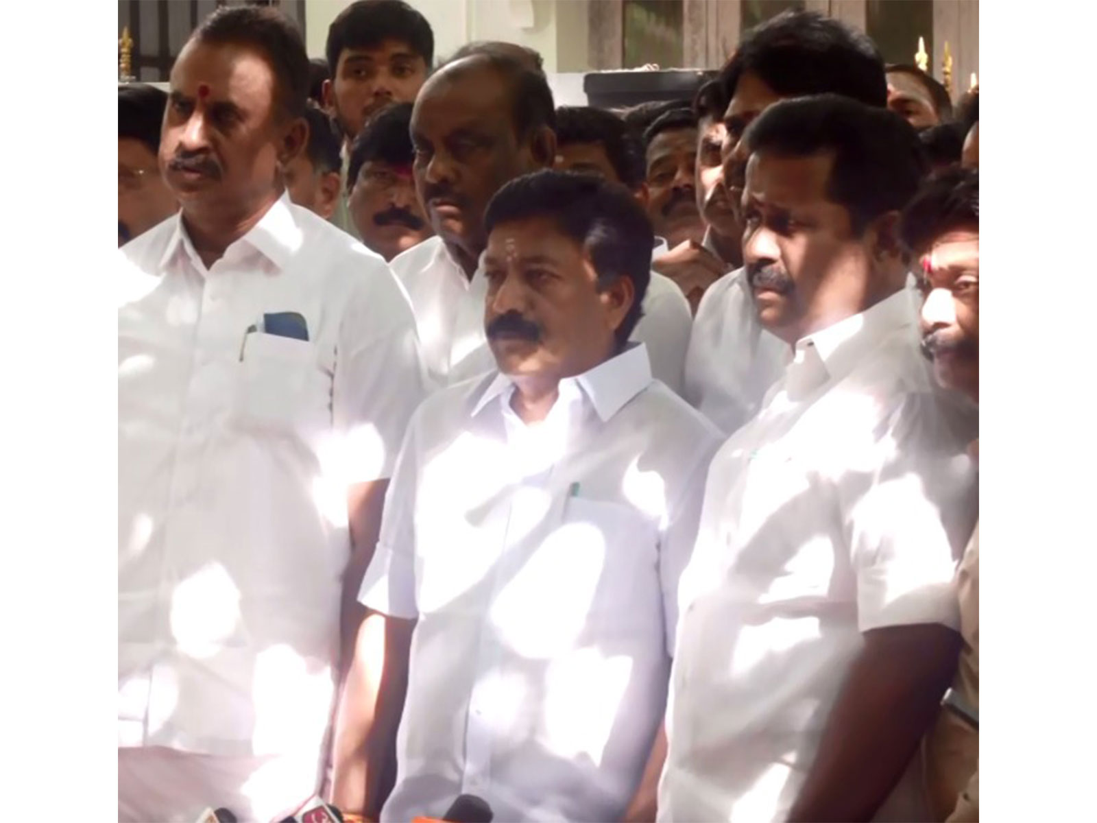 AIADMK MLA CV Shanmugam (C) along with other party leaders (Photo/ANI)