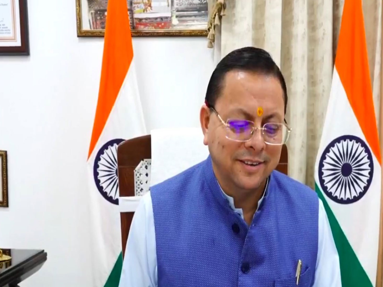 Uttarakhand CM Dhami on call with Arina Raghuvanshi (Photo/ANI)