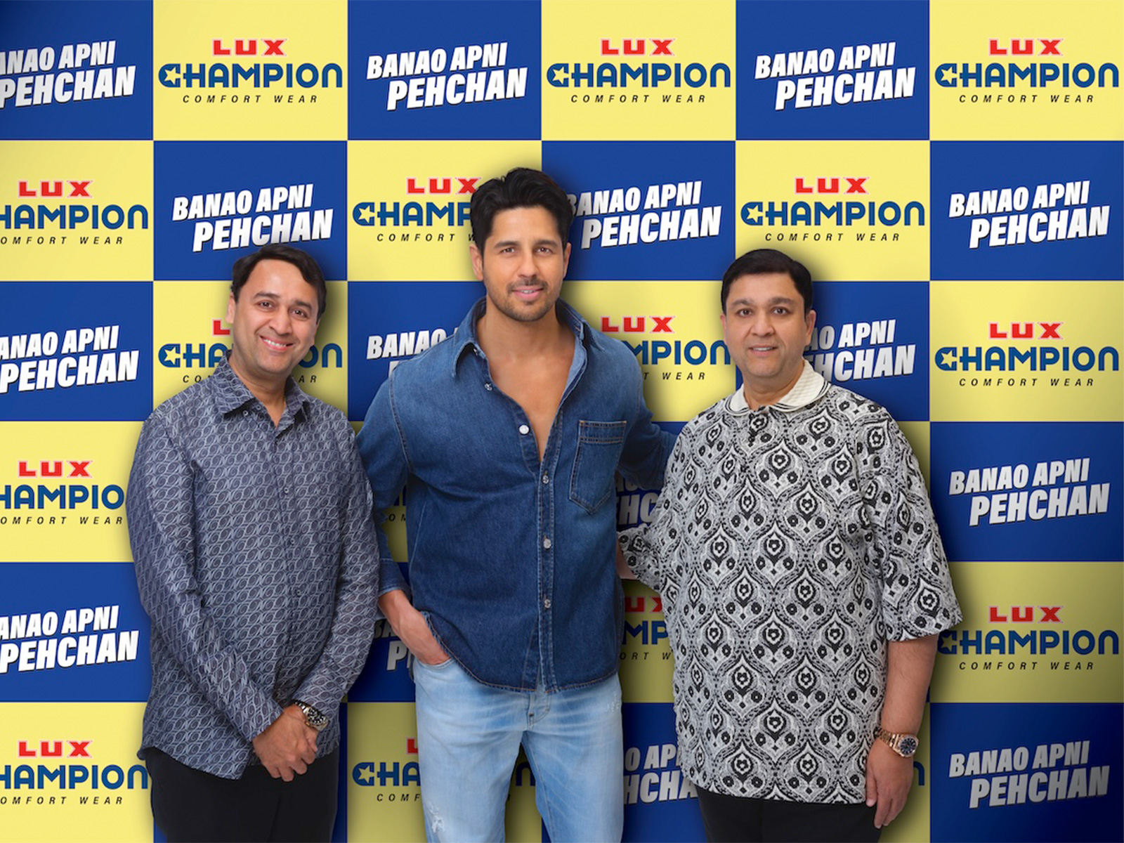 Redefining comfort and style: Lux Industries Directors Rahul Kumar Todi (Left) and Navin Kumar Todi (Right) welcome Sidharth Malhotra (Center) as the new brand ambassador for Lux Champion. Redefining comfort and style: Lux Industries Directors Rahul Kumar Todi (Left) and Navin Kumar Todi (Right) welcome Sidharth Malhotra (Center) as the new brand ambassador for Lux Champion.