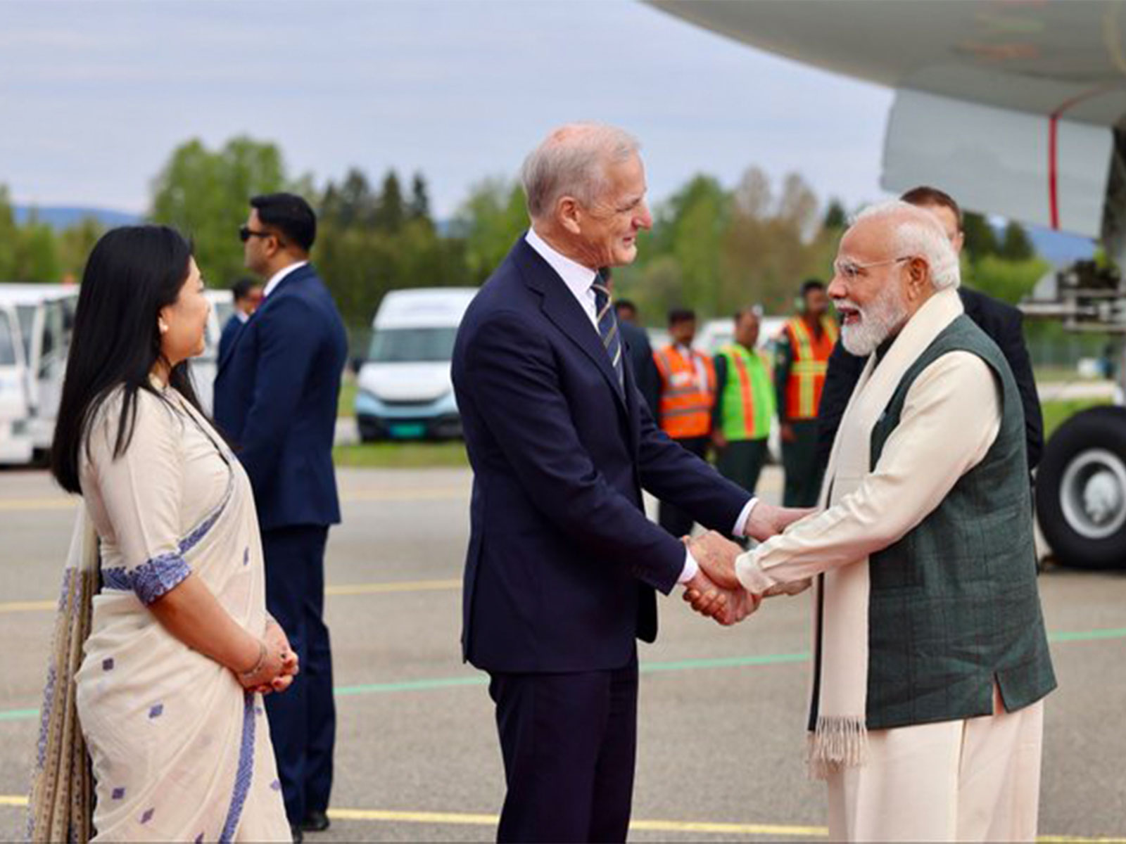 Norwegian Prime Minister Jonas Gahr Store welcomes Prime Minister Narendra Modi upon his arrival in Oslo for a two-day official visit to Norway. (Photo: X/@jonasgahrstore)