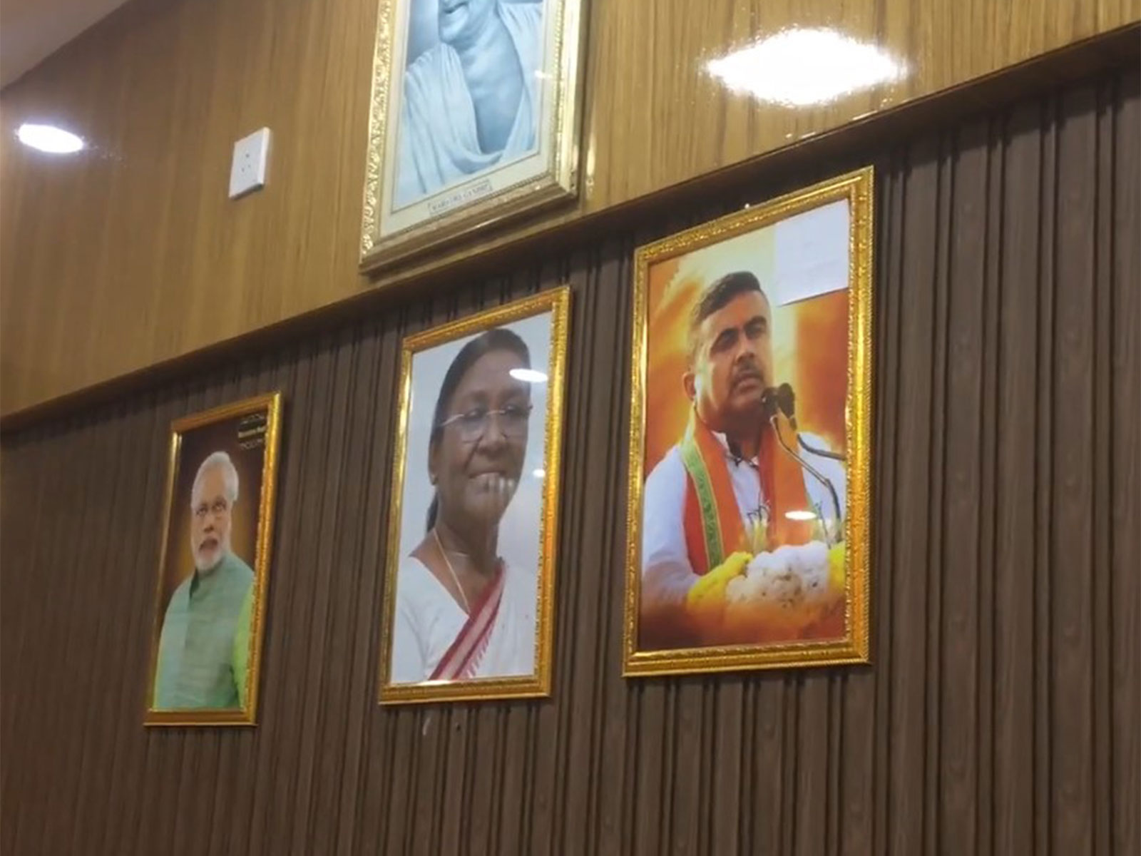 PM Narendra Modi, President Droupadi Murmu, and CM Suvendu Adhikari's portait in Asansol Mayor's office (Photo/ANI) PM Narendra Modi, President Droupadi Murmu, and CM Suvendu Adhikari's portait in Asansol Mayor's office (Photo/ANI)