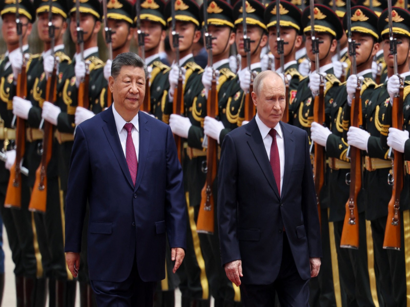 Chinese President Xi Jinping welcomes Russian President Vladimir Putin, Beijing (Photo/Reuters)