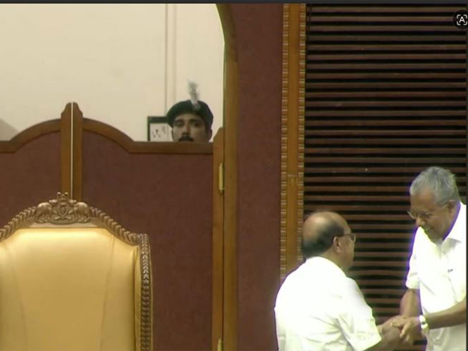 Screegrab of the handshake between G Sudhakaran (left) and Pinarayi Vijayan (Photo/ Kerala Niyamasabha)