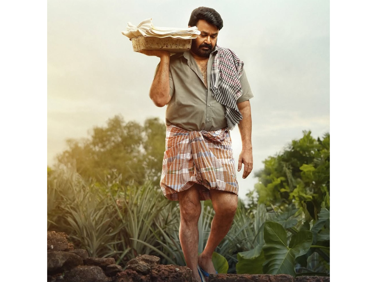 Mohanlal in 'Drishyam' poster (Photo/Instagram@penmovies) Mohanlal in 'Drishyam' poster (Photo/Instagram@penmovies)