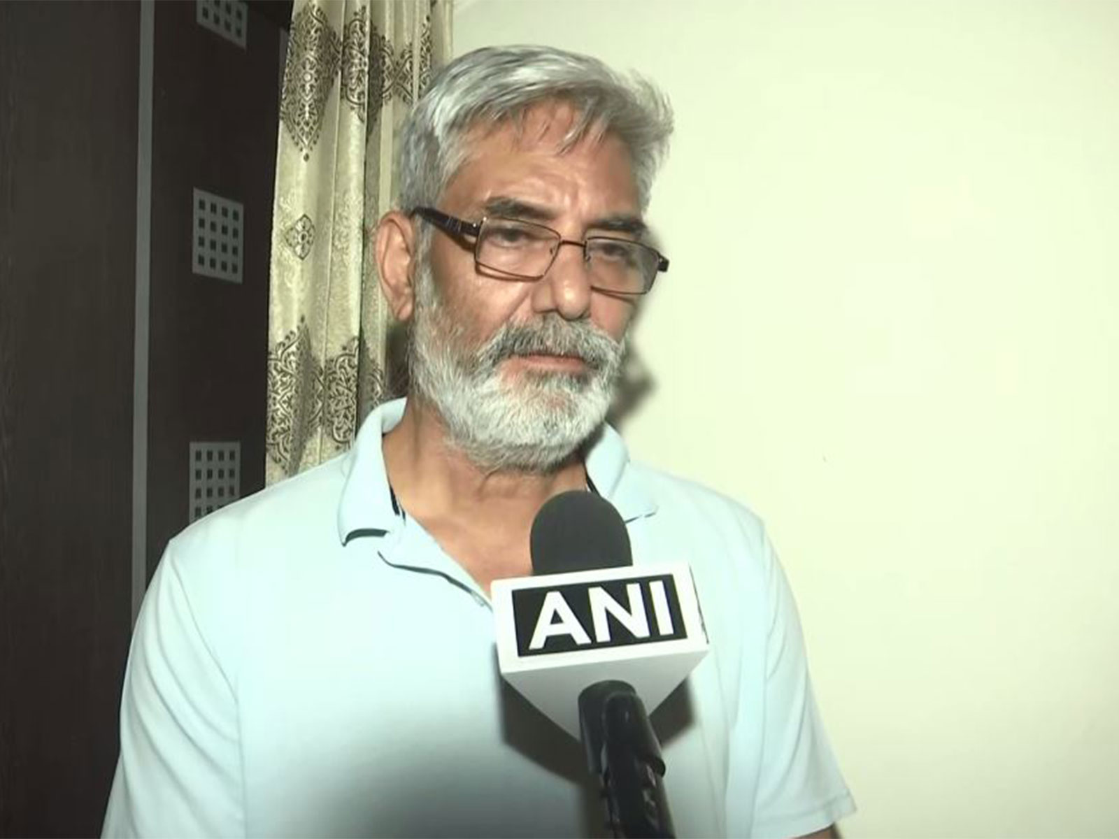 Navnidhi Sharma, Twisha Sharma's father (File Photo/ANI)