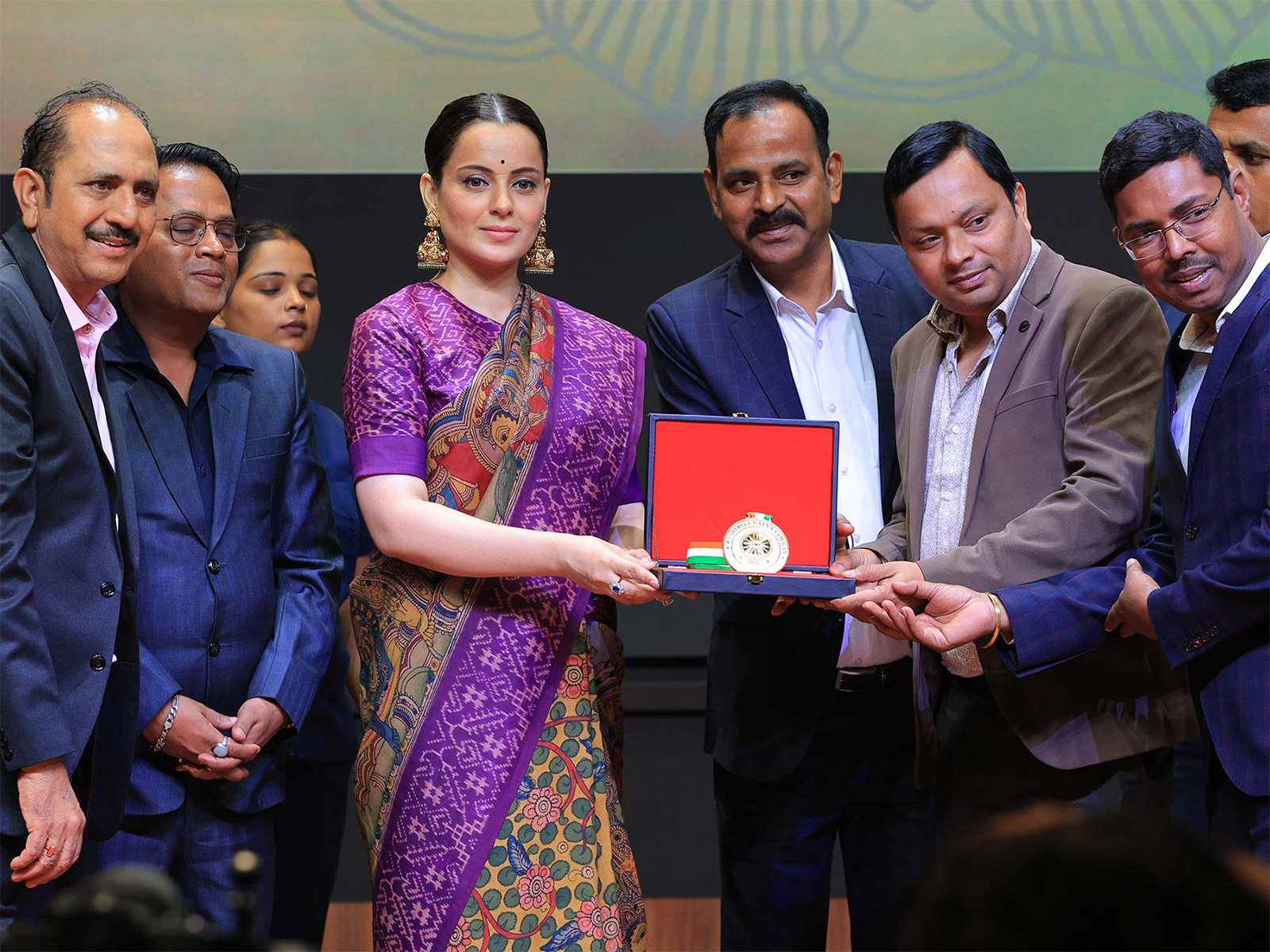 On stage at the Rashtriya Ratna Samman 2026, Atal Kumar Mandal, Founder of Decibel India Logistics Private Limited, along with his team, receives the award for 'The Bengal Supply Chain Distinction for Scalability and Trust' from Ms. Kangana Ranaut. On stage at the Rashtriya Ratna Samman 2026, Atal Kumar Mandal, Founder of Decibel India Logistics Private Limited, along with his team, receives the award for 'The Bengal Supply Chain Distinction for Scalability and Trust' from Ms. Kangana Ranaut.