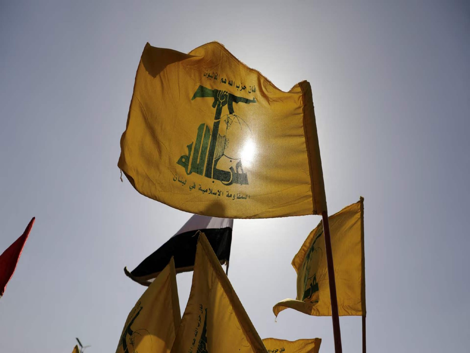 Hezbollah flags seen fluttering in Lebanon. (Photo/Reuters)