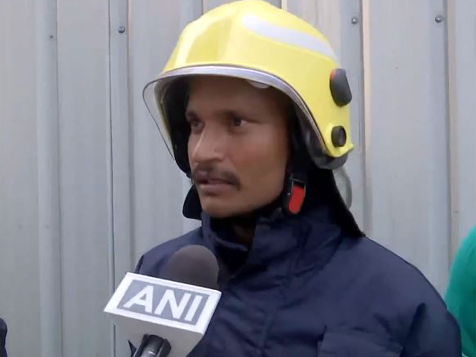 A firefighter engaged in dousing operation in Muzaffarpur (Photo/ANI)