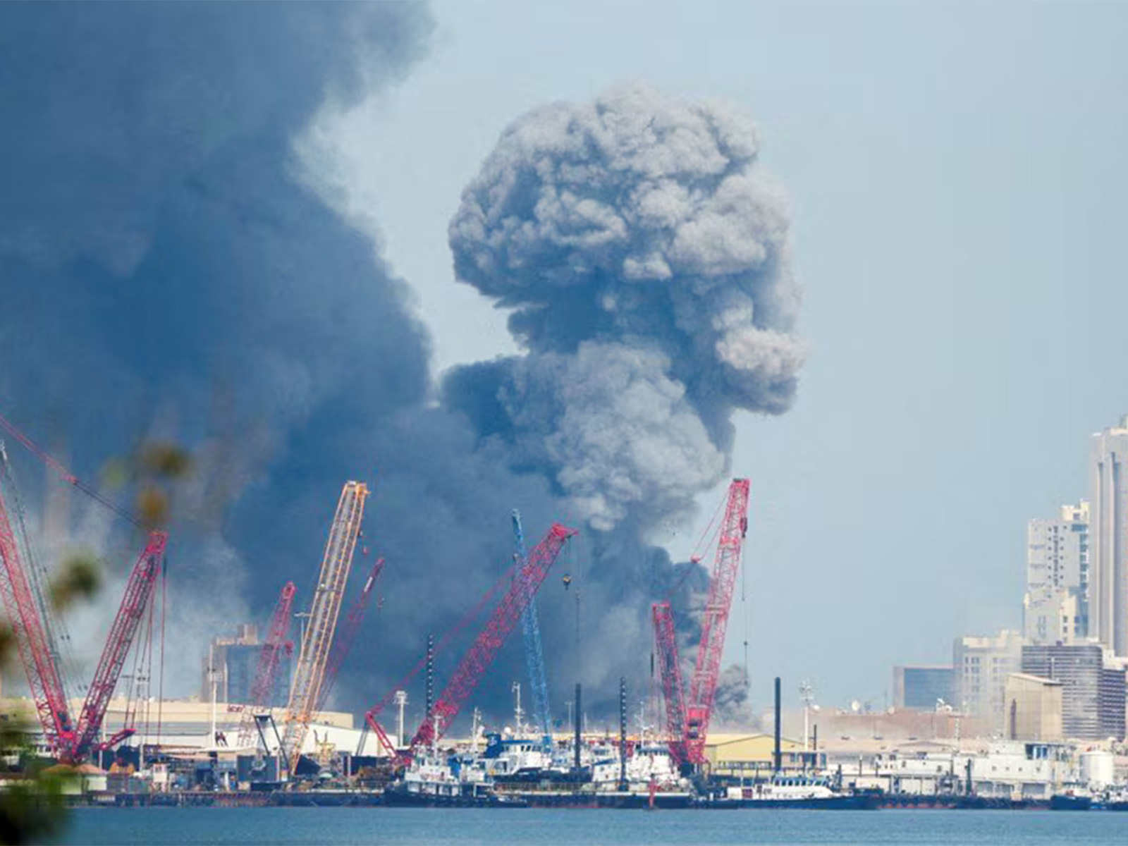 Smoke rises over Manama, Bahrain, after blasts were reported in the city. (Photo/Reuters)