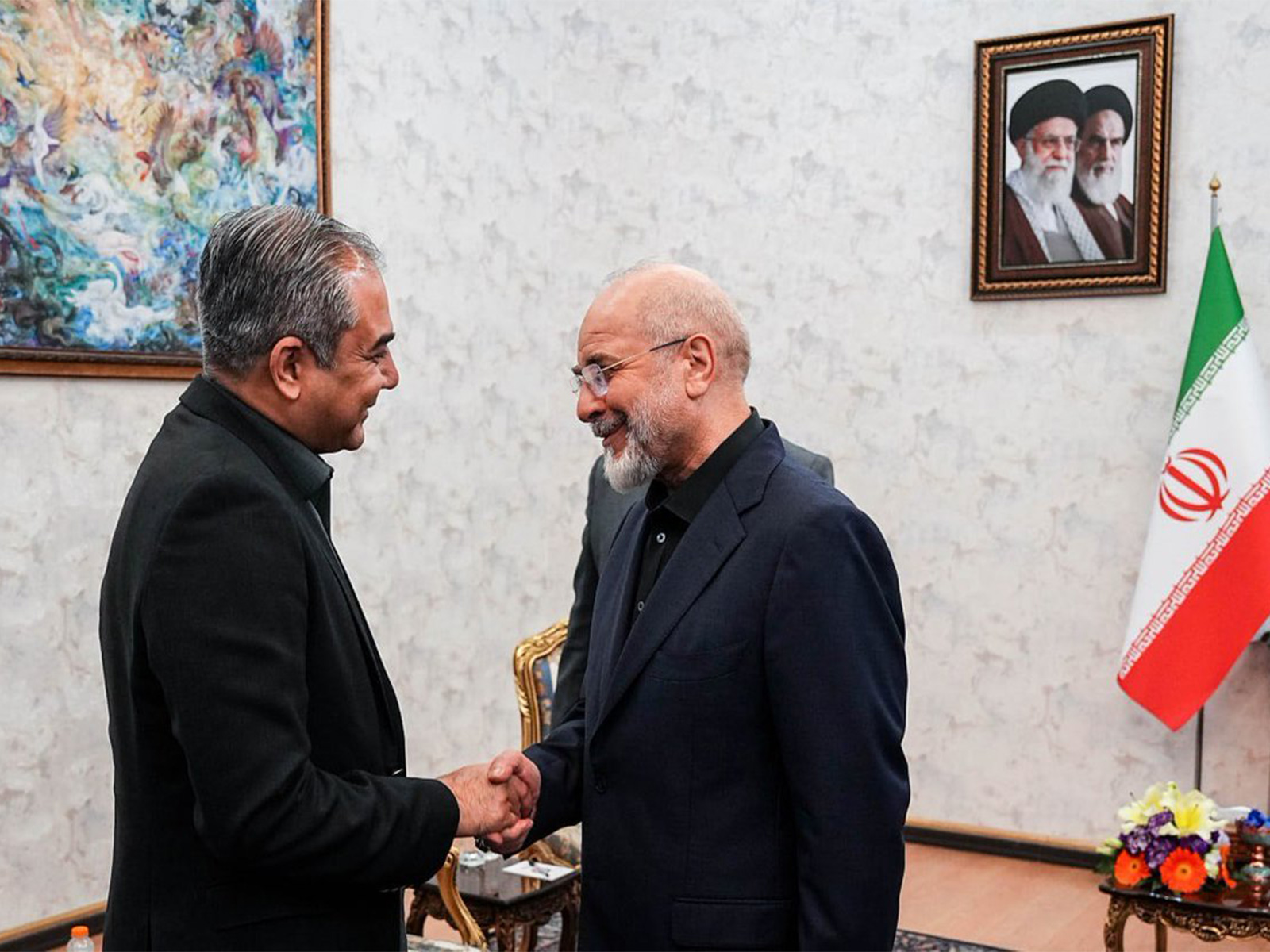 Iranian Parliament Speaker Mohammad Bagher Ghalibaf shakes hands with Pakistan's Interior Minister Mohsin Naqvi during their meeting in Tehran, Iran. (Image Source: Iranian state media) Iranian Parliament Speaker Mohammad Bagher Ghalibaf shakes hands with Pakistan's Interior Minister Mohsin Naqvi during their meeting in Tehran, Iran. (Image Source: Iranian state media)