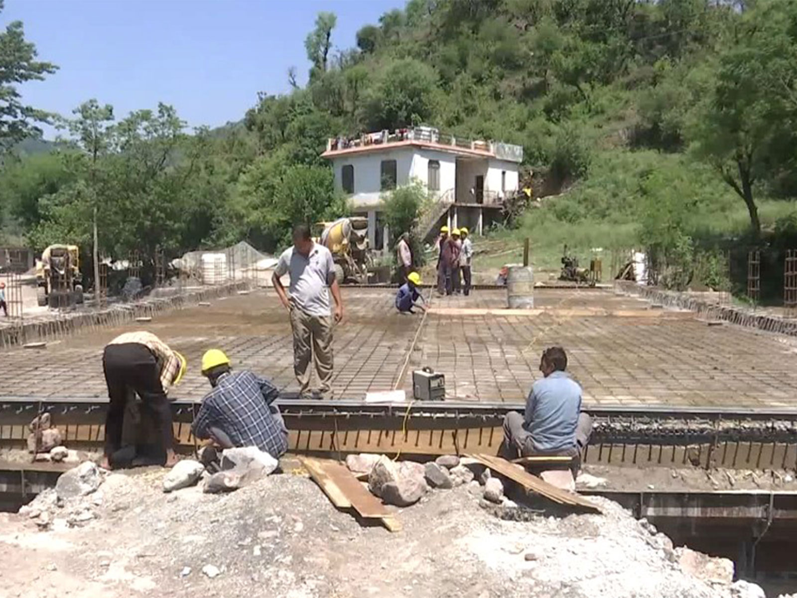 Ongoing work at the Rajouri-Reasi bridge (Photo/ANI)