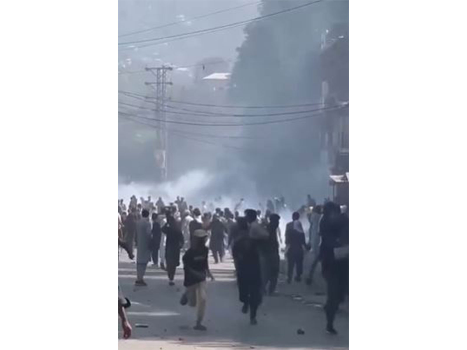 Tear-gas shelling on protesters in PoJK (Photo/ANI) Tear-gas shelling on protesters in PoJK (Photo/ANI)