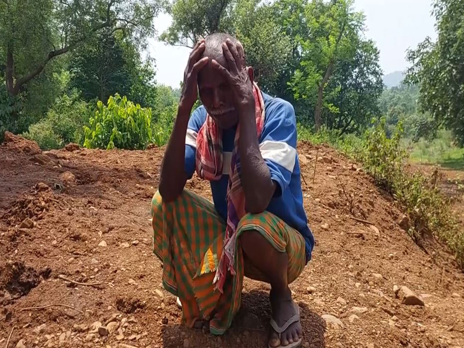 Farmer in distress over damage to agricultural land caused by mining activities in Odishaโs Mayurbhanj district (Photo/ANI) Farmer in distress over damage to agricultural land caused by mining activities in Odishaโs Mayurbhanj district (Photo/ANI)