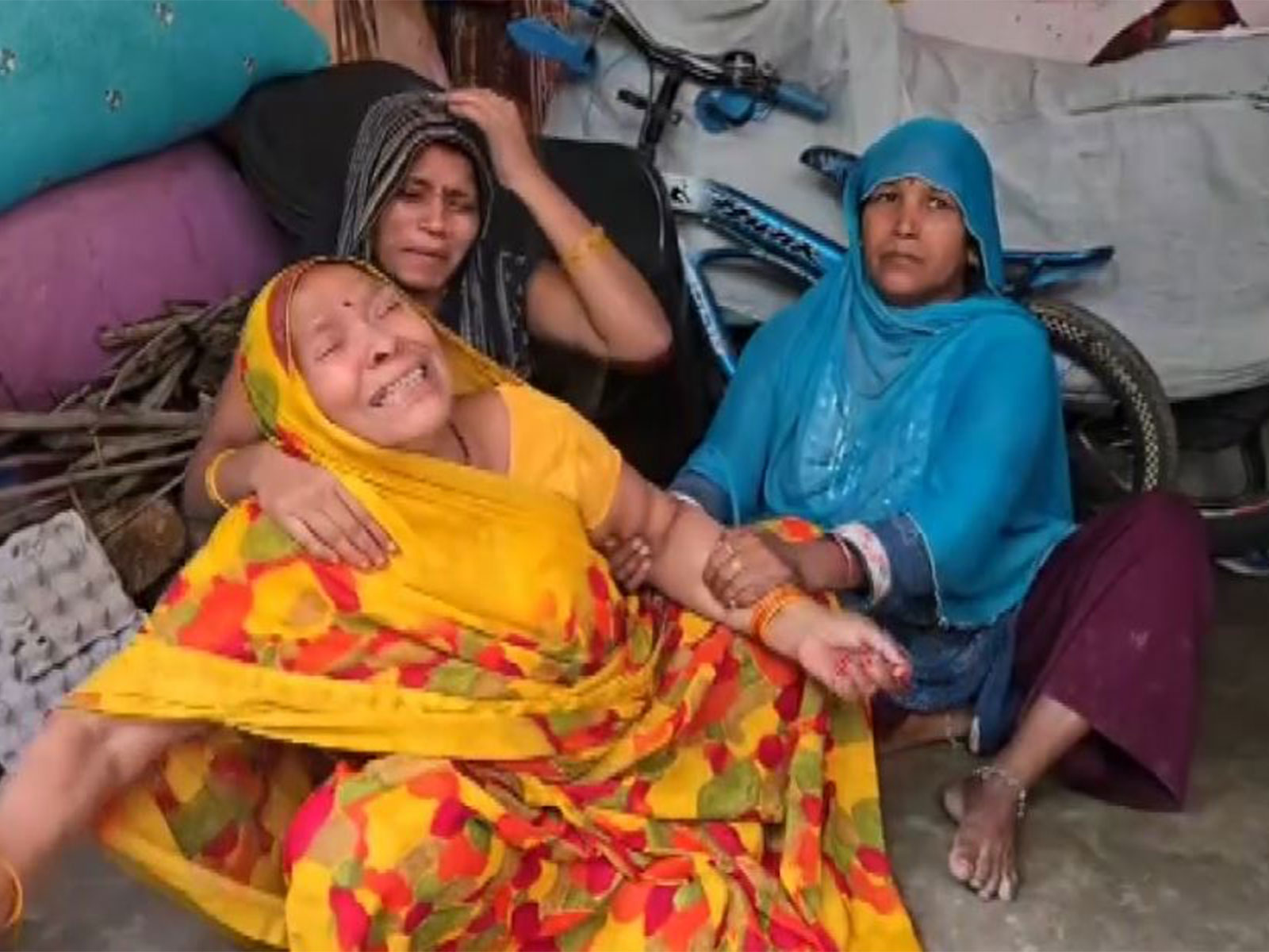 Family members of Shivanand Chaurasia, a Deoria resident and Indian seafarer, break down after hearing news of his death (Photo/ANI)