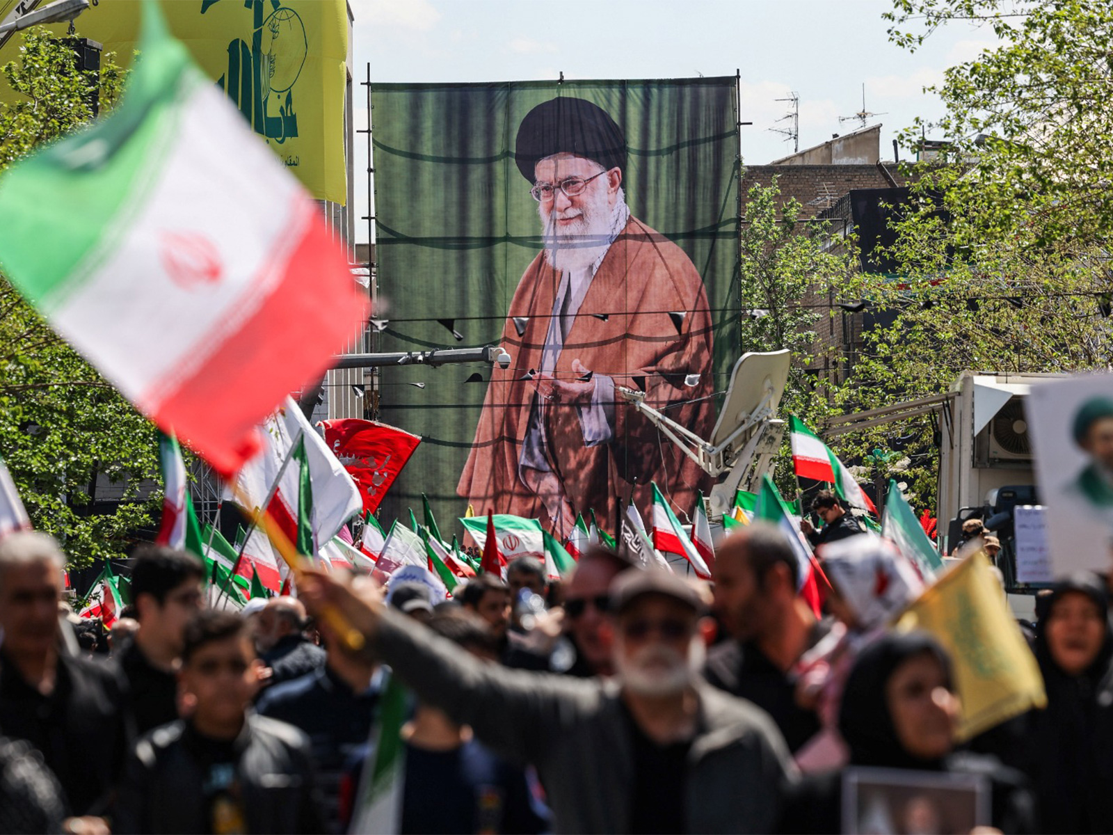 Former Supreme Leader Ayatollah Ali Khamenei's Banner in a rally (Photo/Reuters)